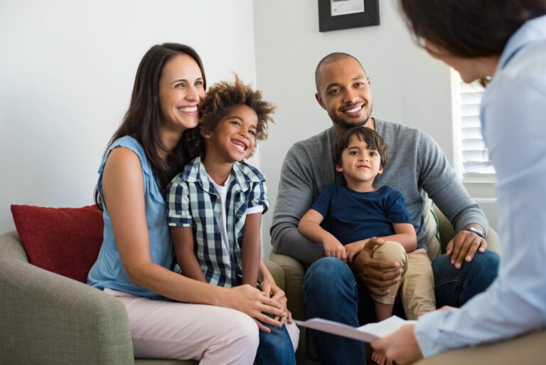 Family counseling session with parents and children in Castle Hills, Hebron, TX